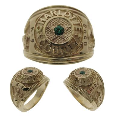 Custom Charlotte County (FL) Sheriff's Deputy class style ring in 10k yellow gold with lab created emerald center stone.